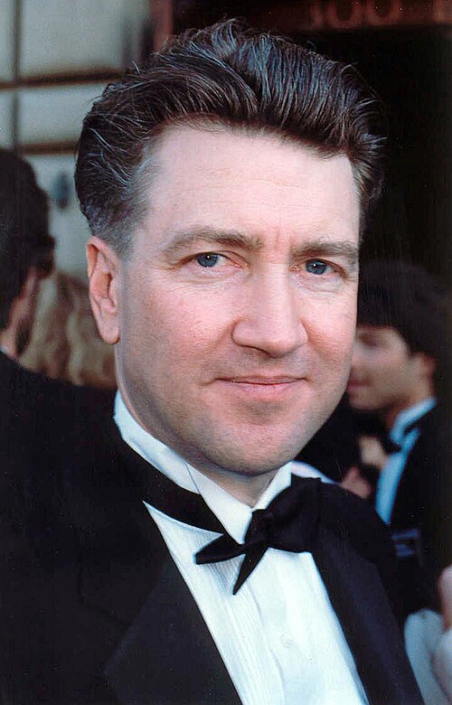 a portrait of david lynch in a tuxedo